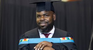 Mr McDonald Mnelemba graduates summa cum laude with his Master’s in Education.